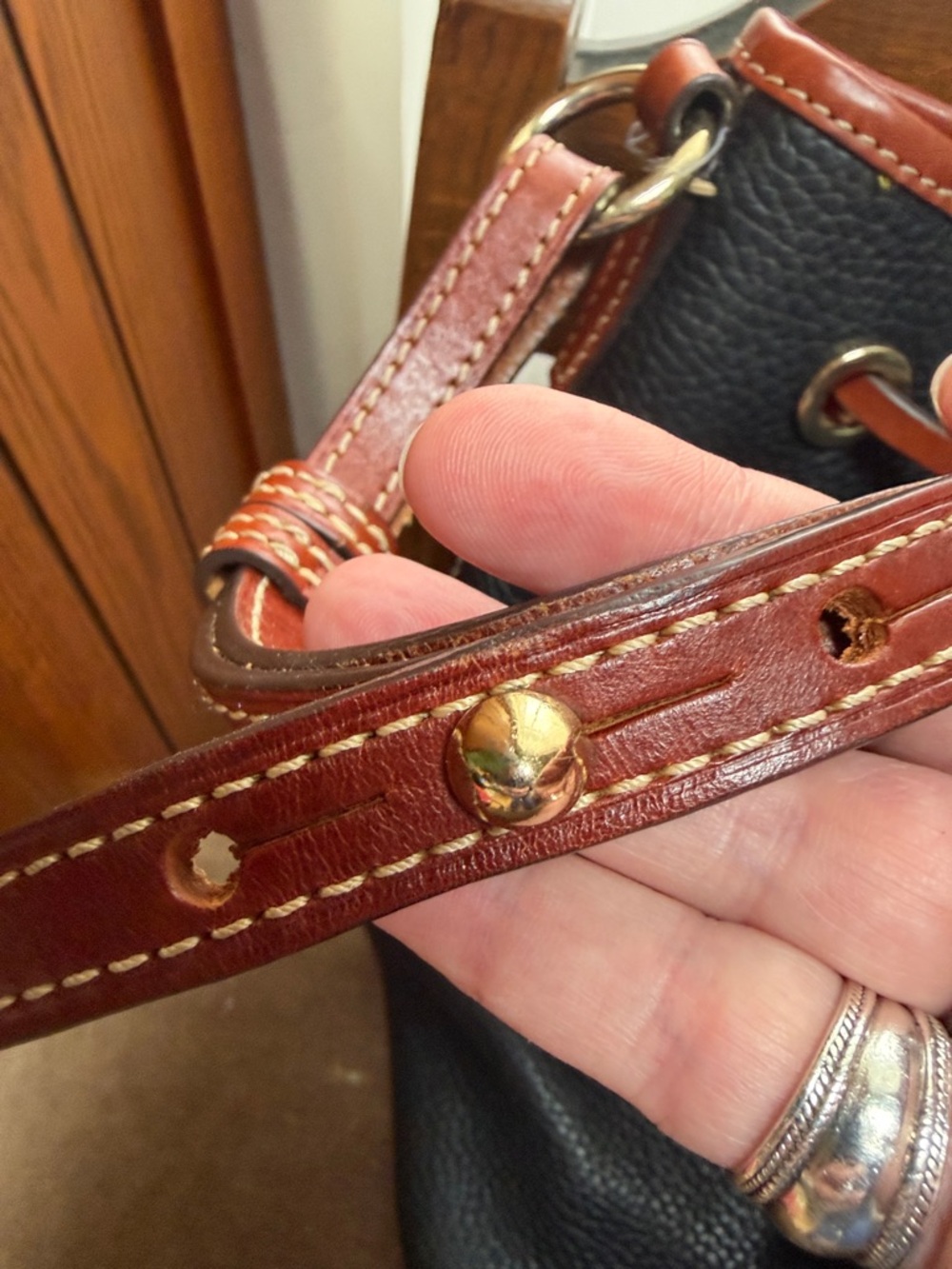 Dooney & Bourke Black Pebbled Leather Tote with Brown leather Trim and Tassel - Picture 10 of 16